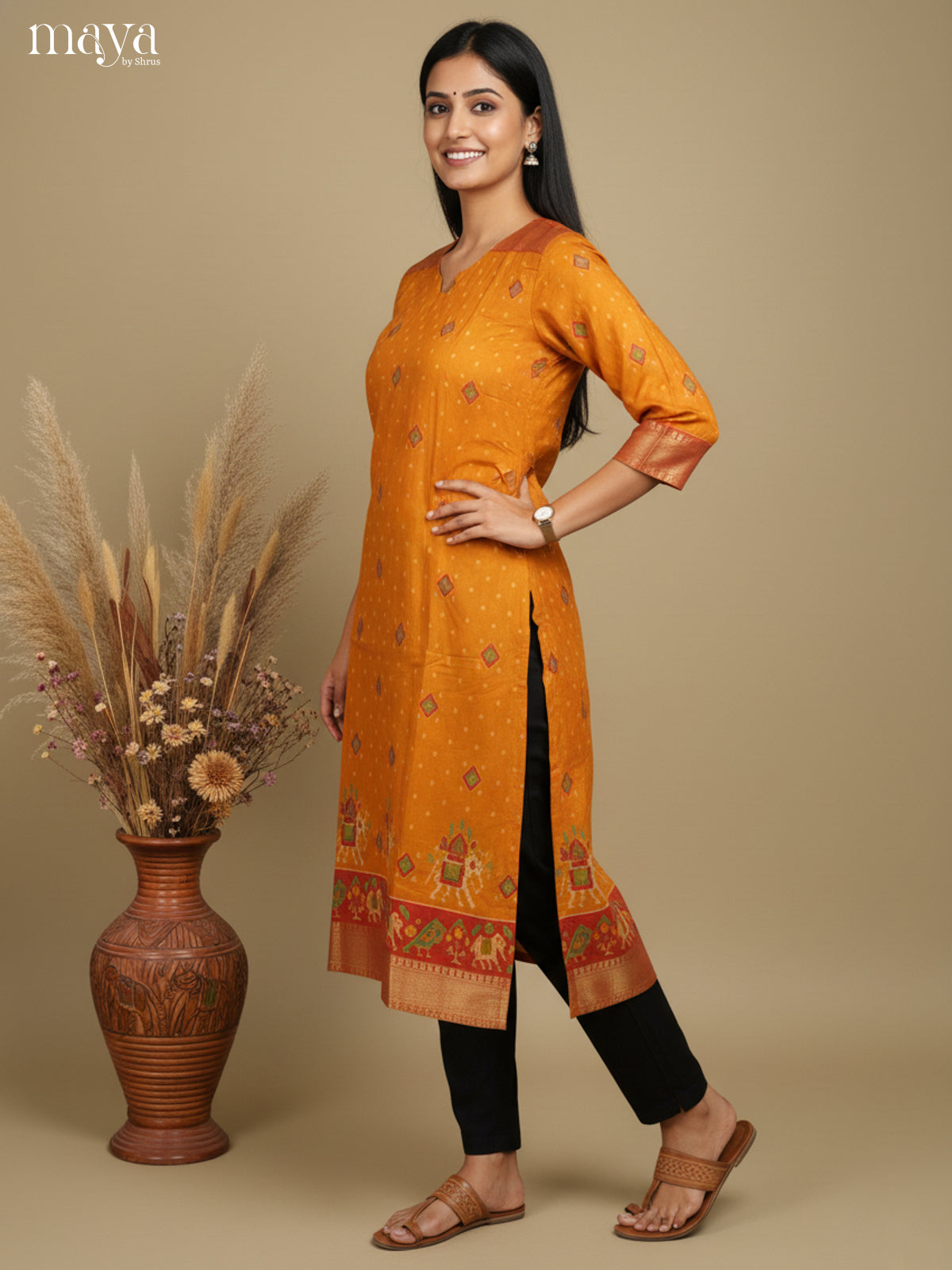 Luxurious Yellow Semi Patola Print Kurti with Silk Zari Border