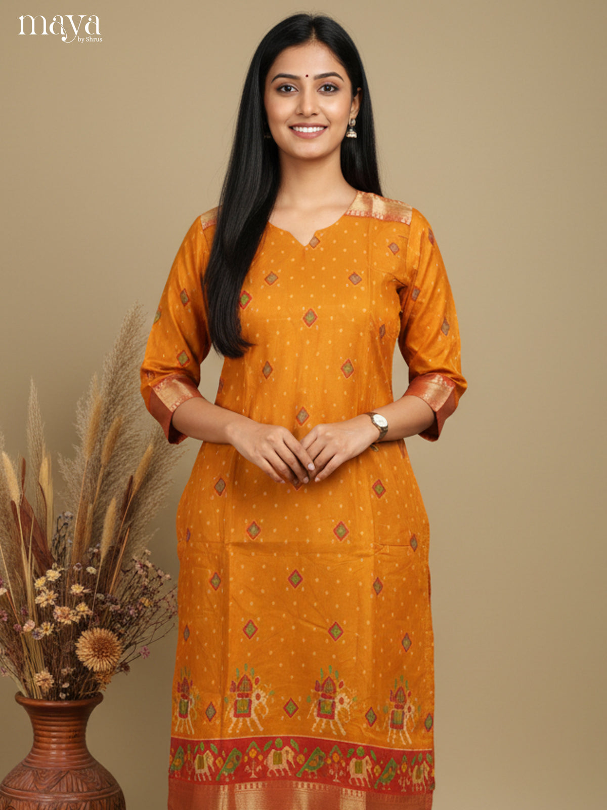 Luxurious Yellow Semi Patola Print Kurti with Silk Zari Border