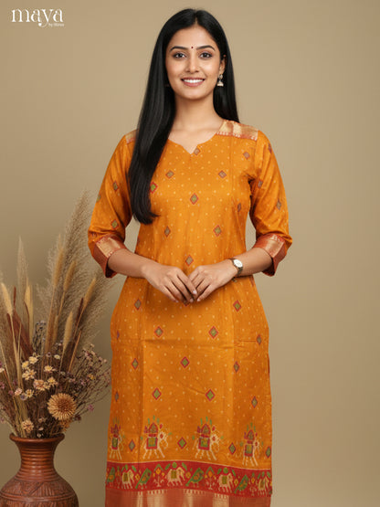 Luxurious Yellow Semi Patola Print Kurti with Silk Zari Border