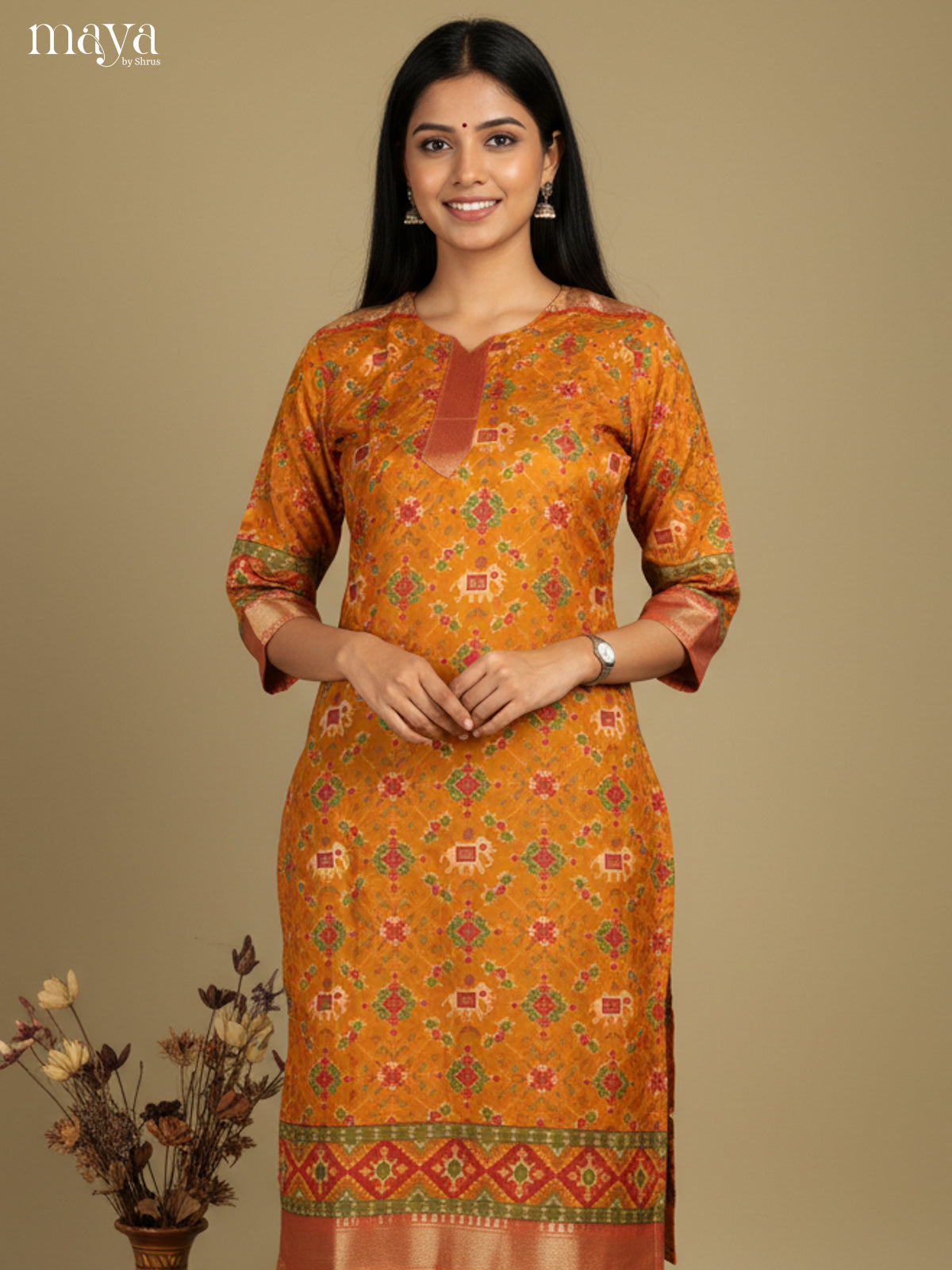 Beautiful Mustard Patola Print Kurti with Silk Zari Border
