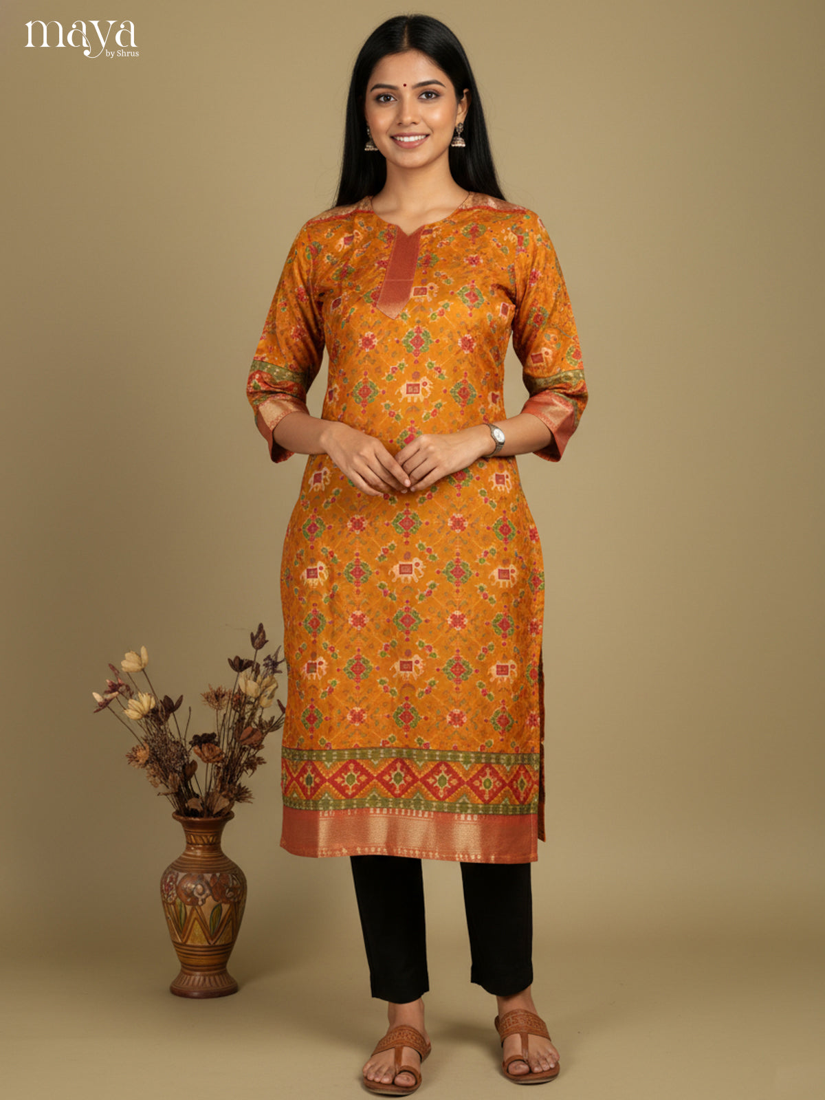 Beautiful Mustard Patola Print Kurti with Silk Zari Border