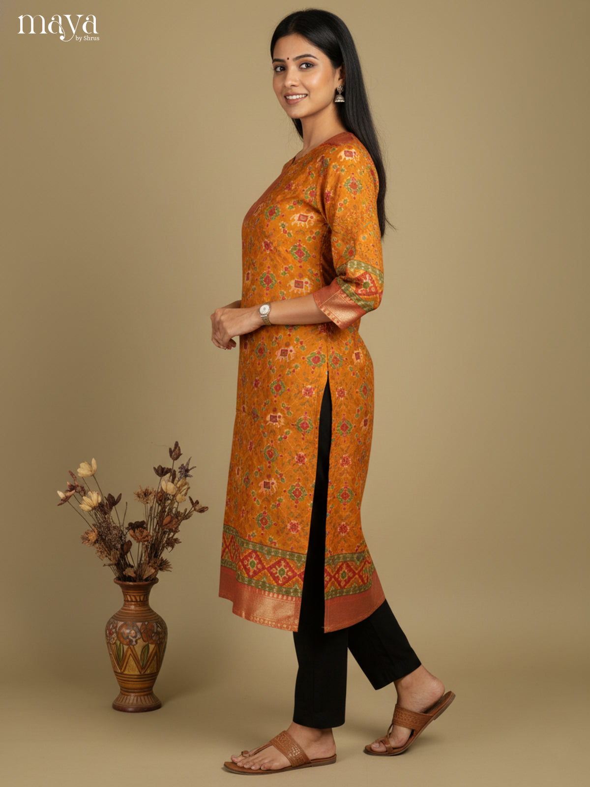 Beautiful Mustard Patola Print Kurti with Silk Zari Border