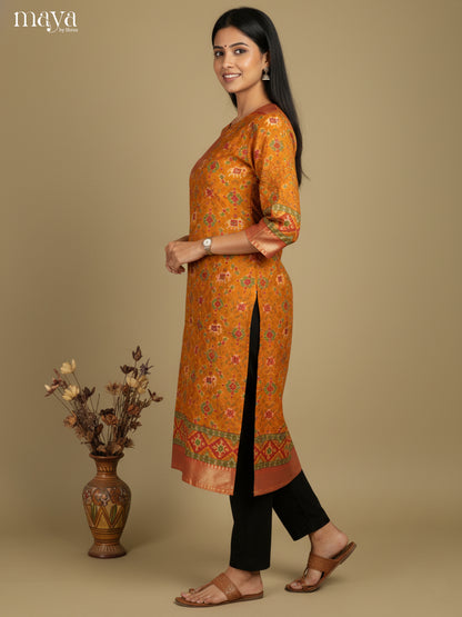 Beautiful Mustard Patola Print Kurti with Silk Zari Border