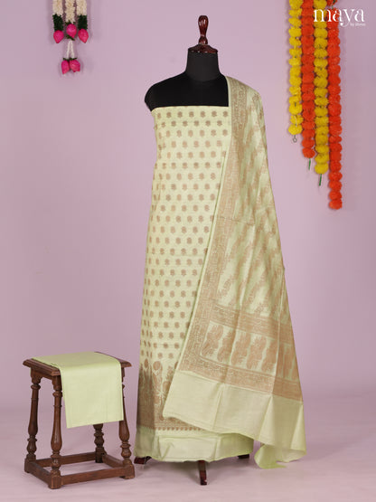 Chic Pastel Green Semi Tussar Salwar Suit Material With Zari Buttas