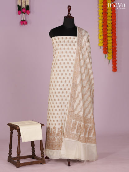 Exquisite Off-White Tussar Salwar Suit Material With Zari Buttas