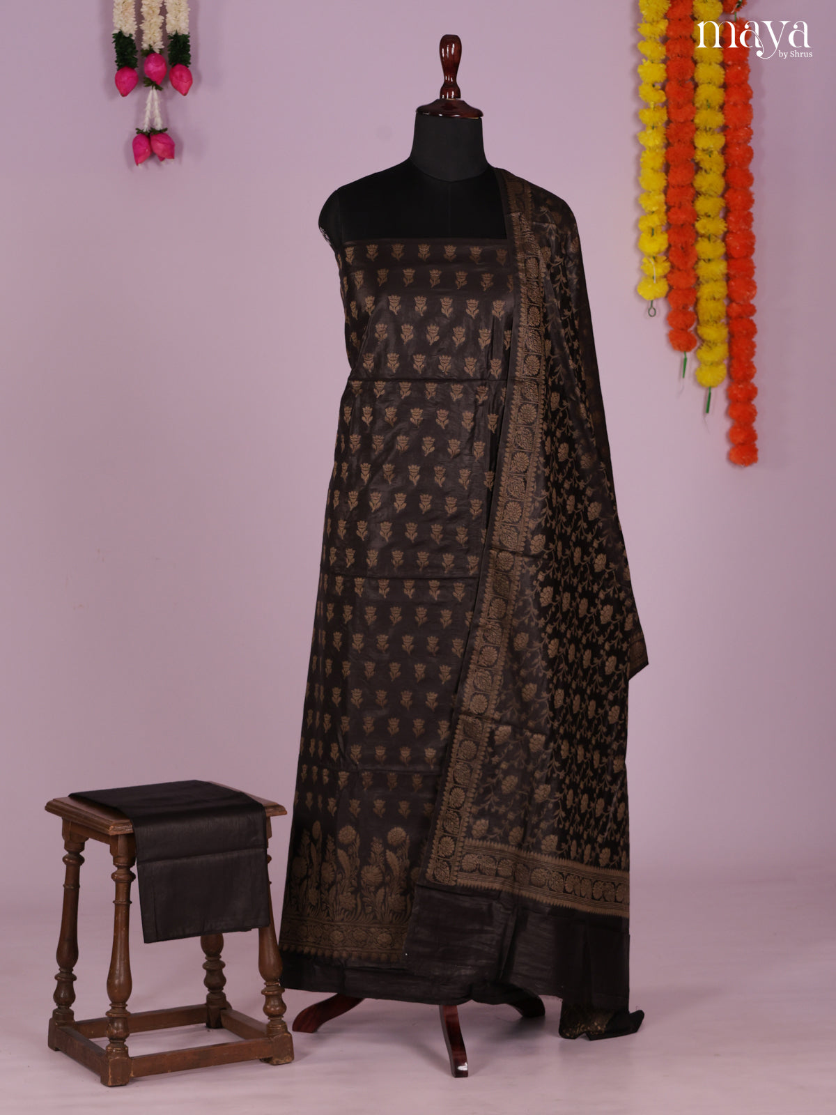 Mystique Black Semi Tussar Salwar Suit Material With Zari Buttas