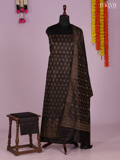 Mystique Black Semi Tussar Salwar Suit Material With Zari Buttas