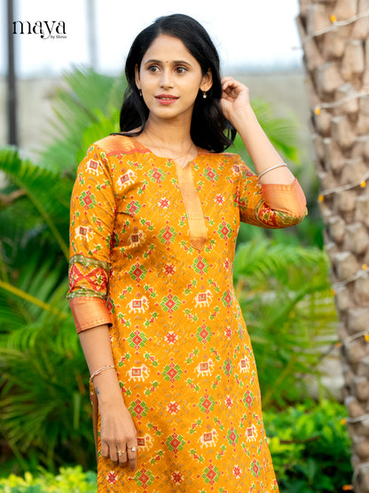 Beautiful Mustard Patola Print Kurti with Silk Zari Border